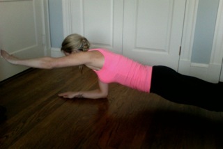 Plank with arm lift